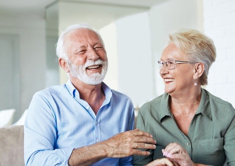 Old couple smiling