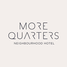 A logo for a hotel called more quarters neighborhood hotel.