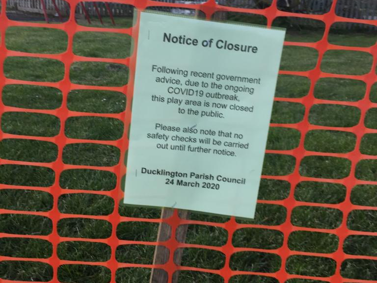 Playground closure notices displayed