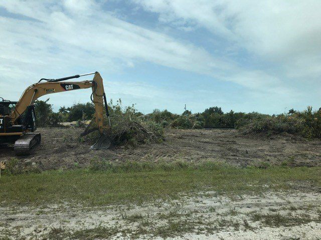 Land Clearing Services — Land Clearing with Backhoe in Punta Gorda, FL