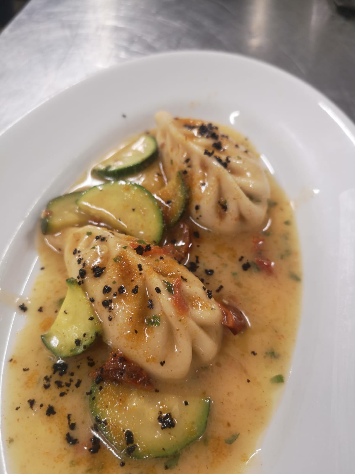 stewed culurgiones with courgettes