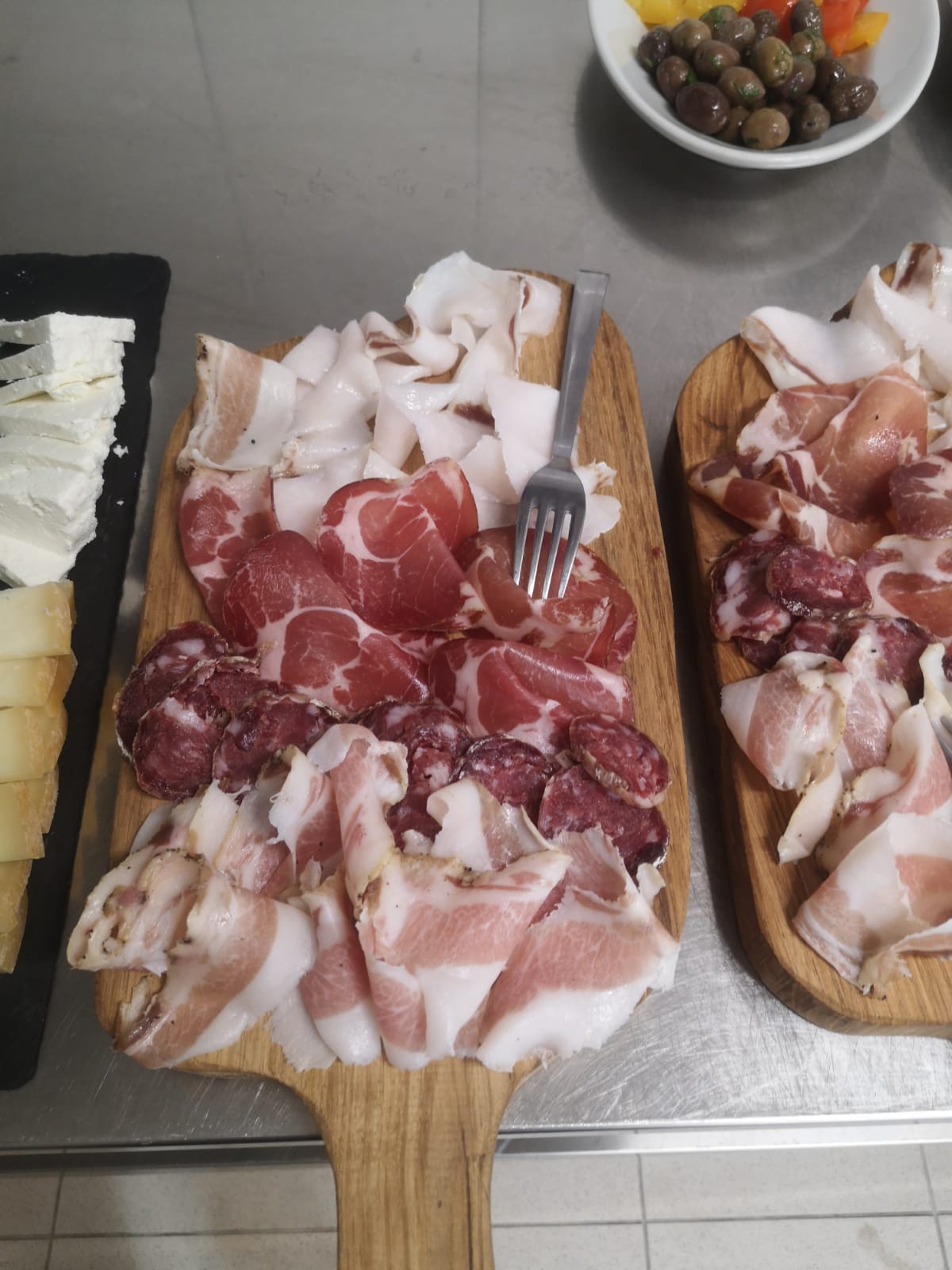 chopping boards with 0 km cured meats