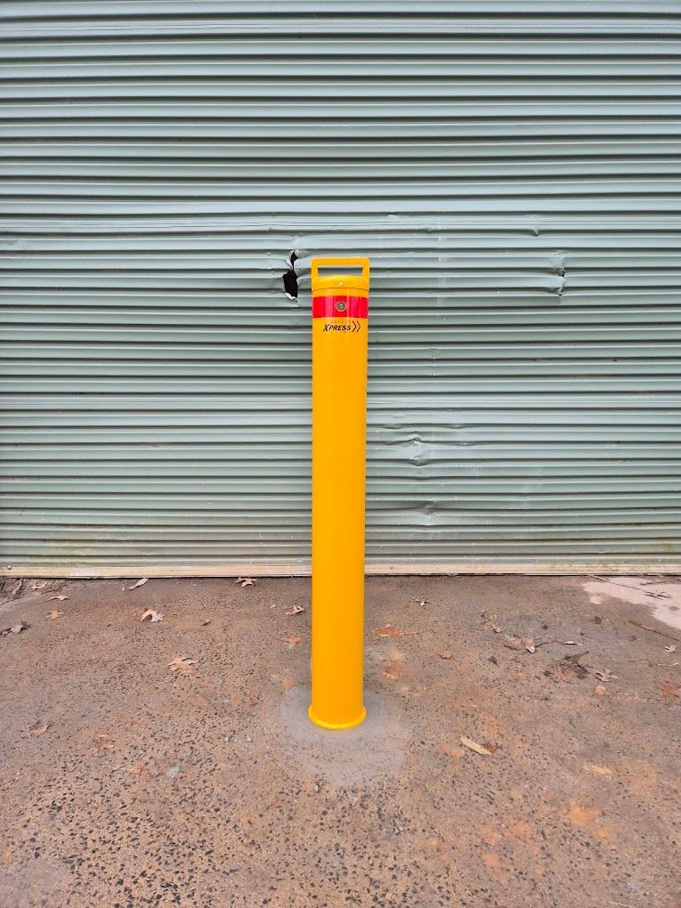 6 small bollard installed in a public space to prevent vehicle access