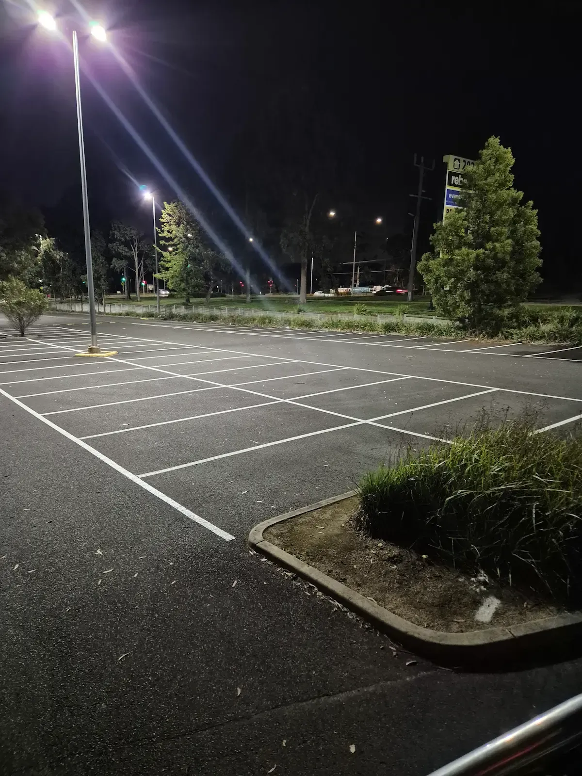 2 rows of car park bays re line marked at chirnside park home maker centr 