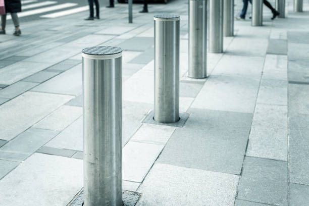 6 small bollard installed in a public space to prevent vehicle access