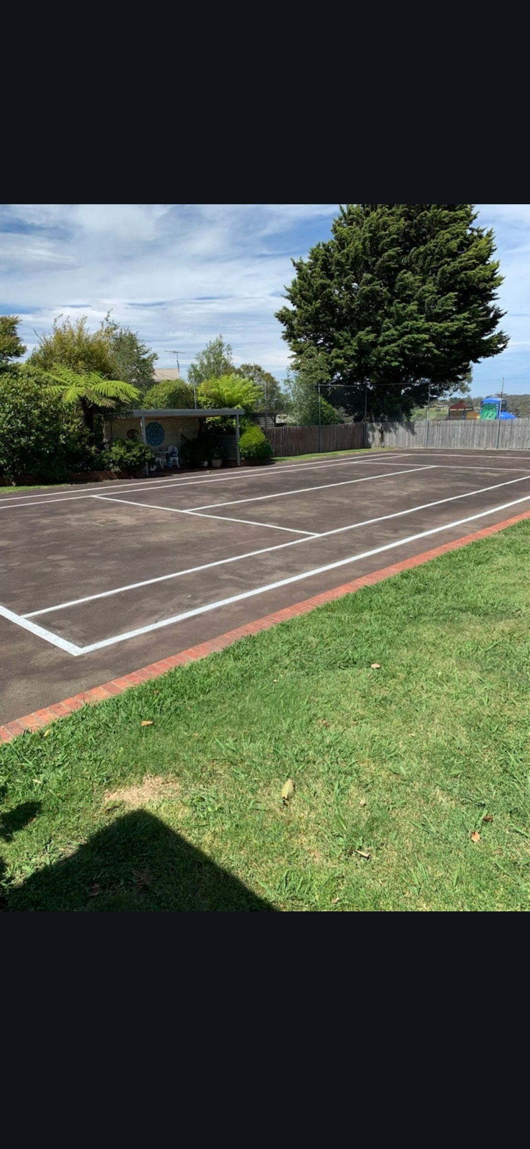 Tennis court line marking in Moe  Victoria