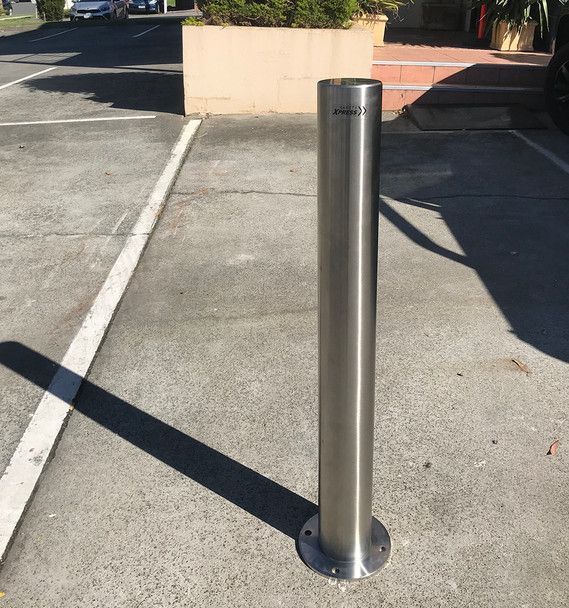 chrome bollard next to parking spot