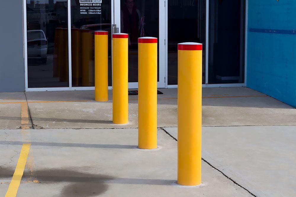4 bollards protecting infrastructure from damage