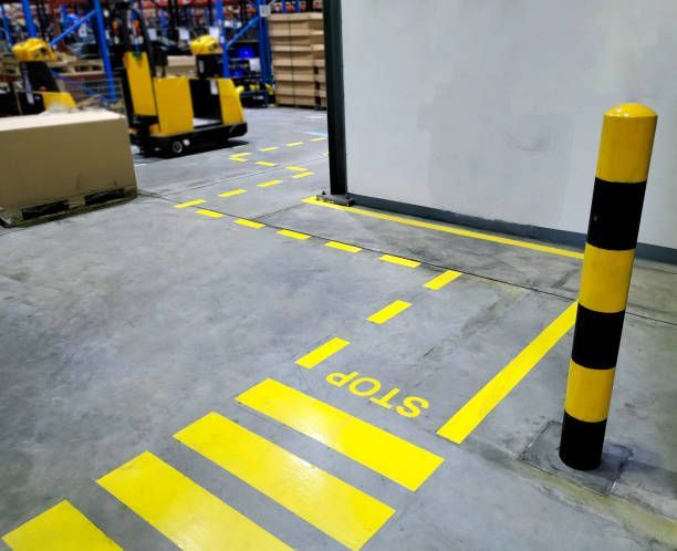Bollard in a warehouse near pedestrian walkway