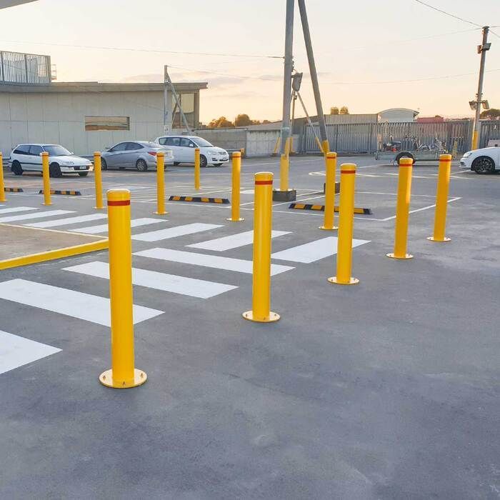 row of bollards safeguarding pedestrian walkway