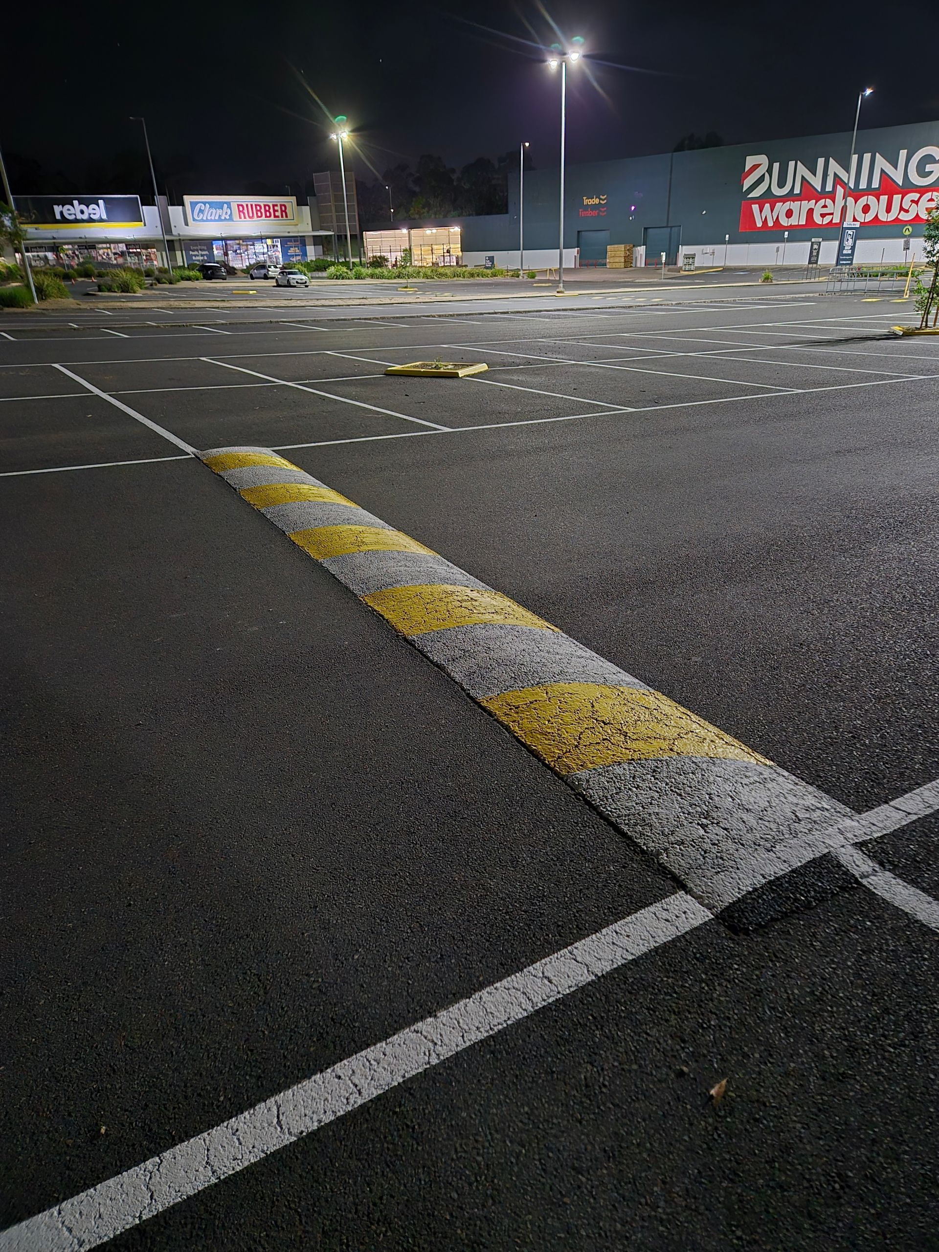 Speed humps paint, white and yellow at chirnside park home maker centre 
