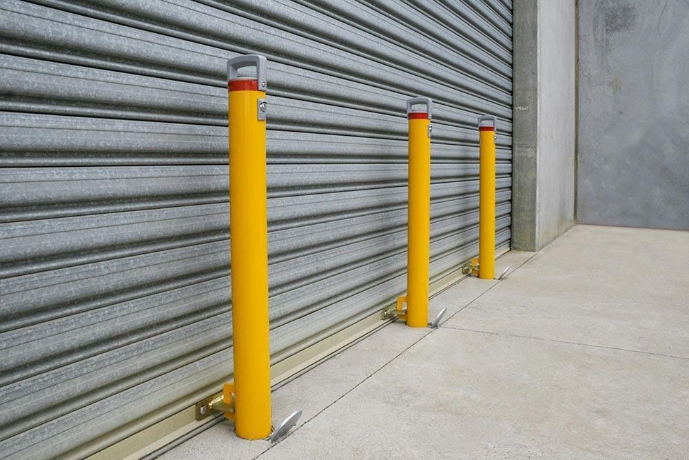 3 bollard connected to a garage roller door