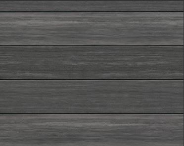 A close up of a gray wooden plank wall.