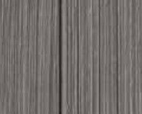 A close up of a gray wood grain texture.