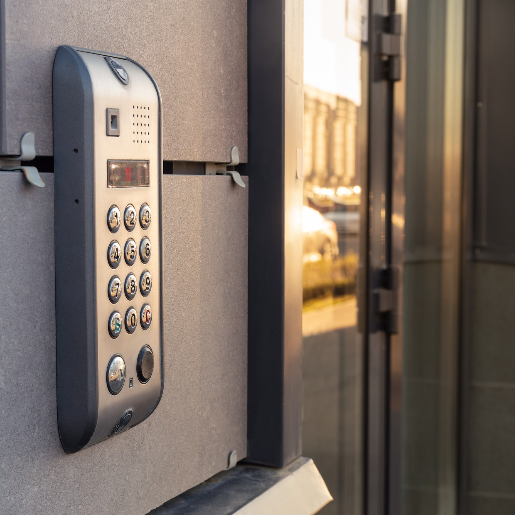 A smart lock keypad on the side of a building 