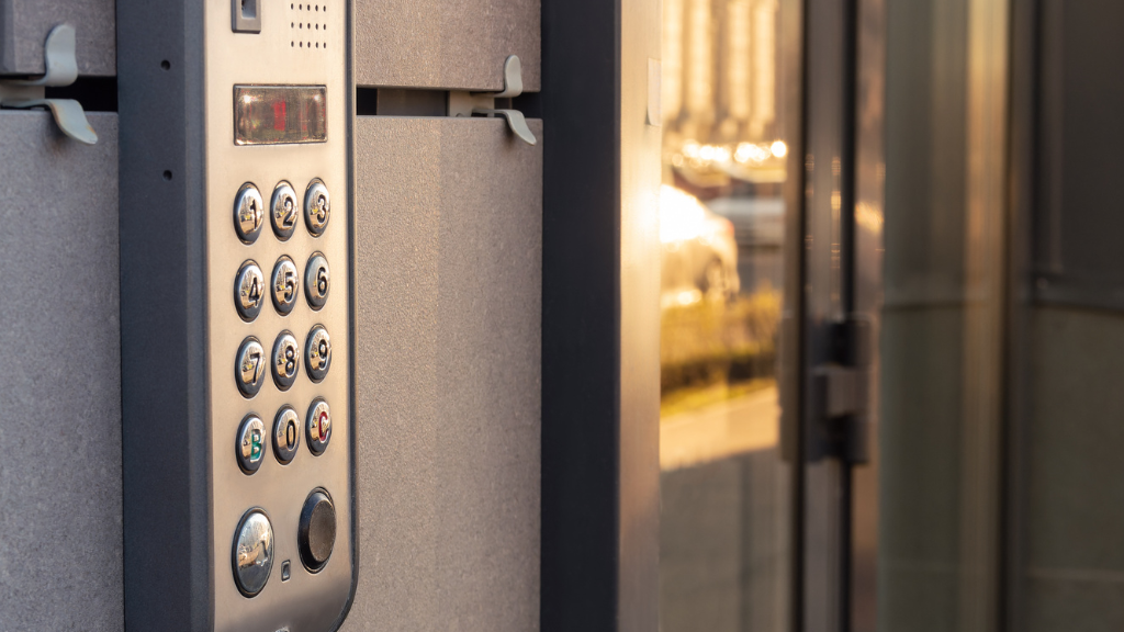 A close up of a keypad on a wall