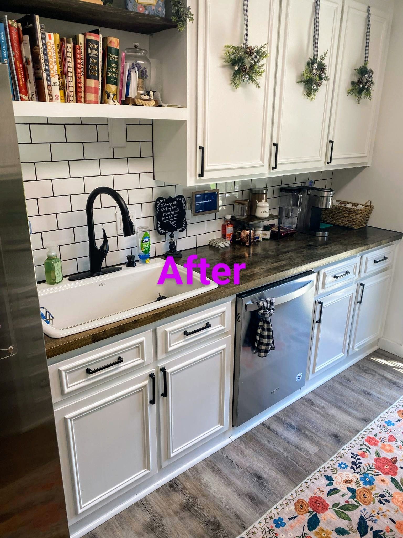 Kitchen remodel, white cabinets, black hardware, wood countertops, black and white tile backsplash.