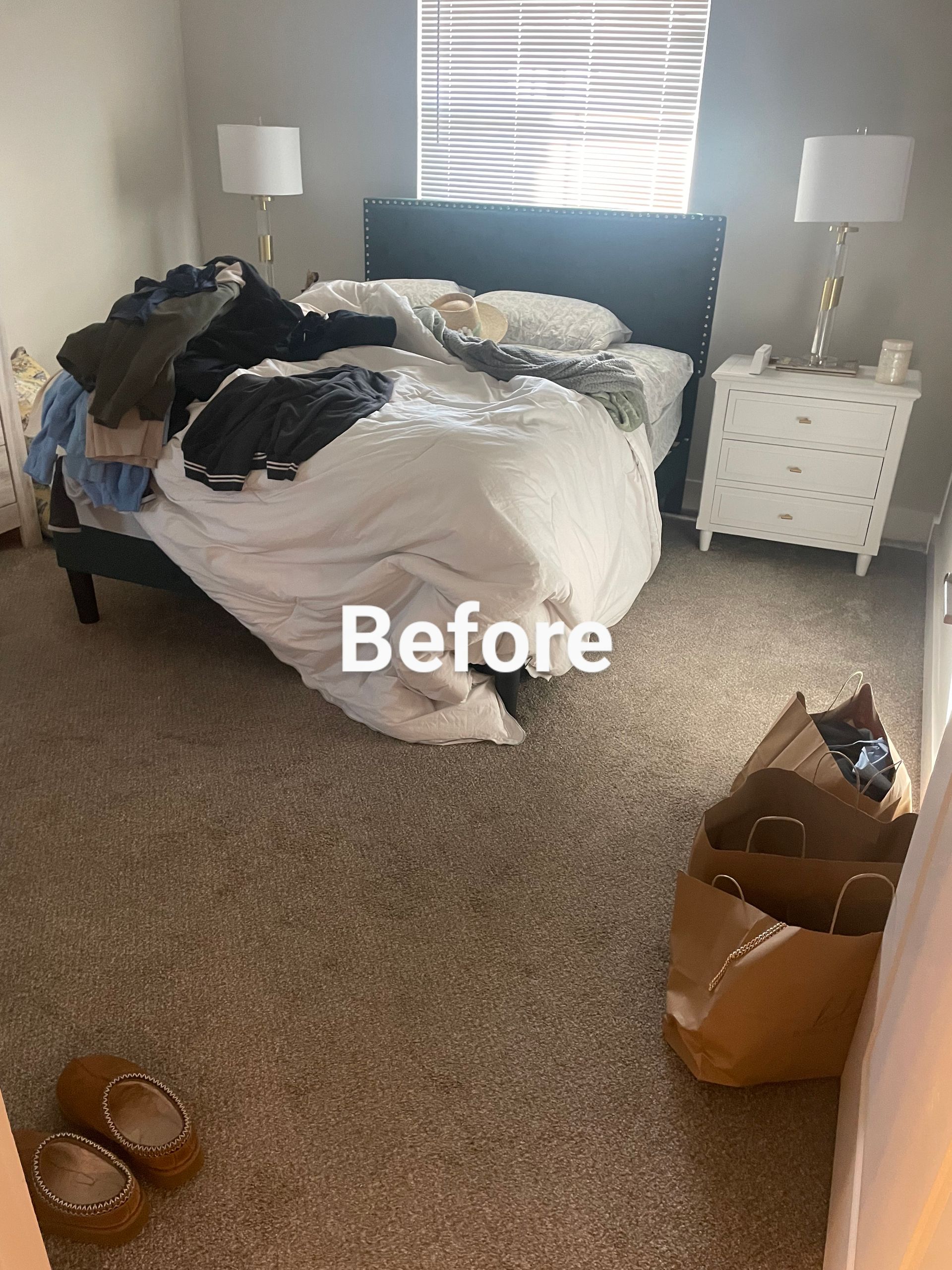 Bedroom with unmade bed, clothes strewn about. Brown paper bag and shoes on floor.