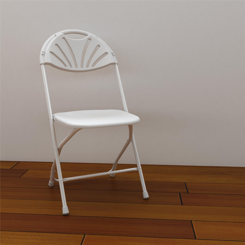 White folding chair against a white wall, on a wooden floor.