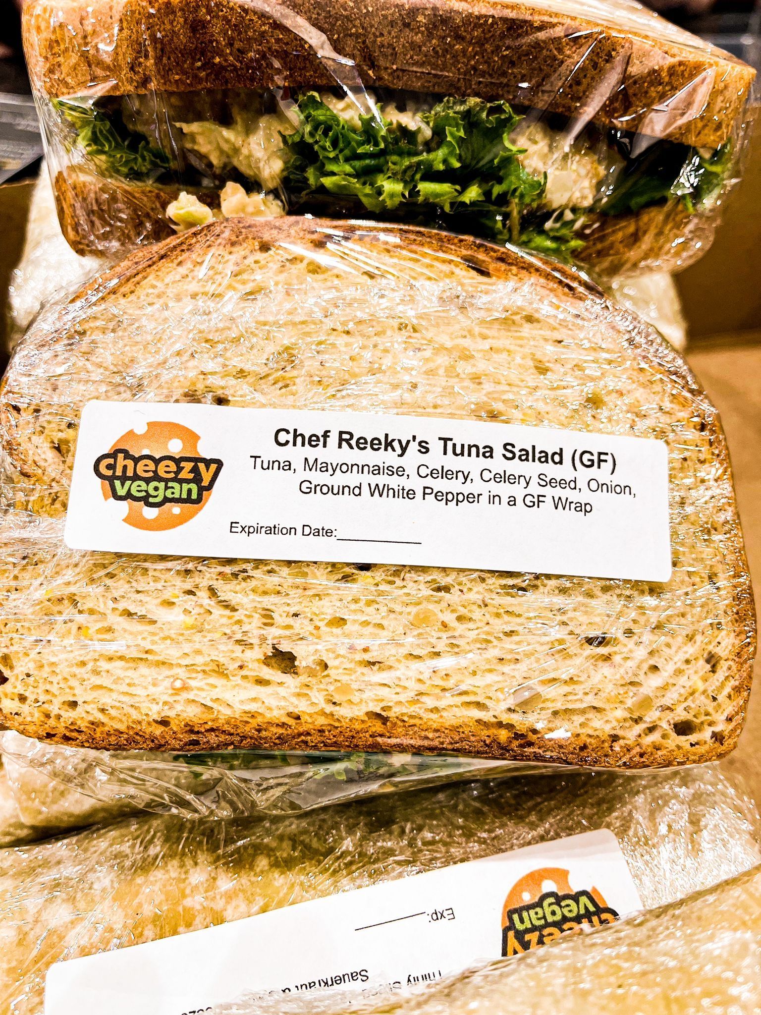 Wrapped sandwiches from Cheezy Vegan, featuring