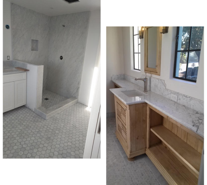 Bathroom with marble and wood finishes; includes a shower and vanity with sink and shelves.