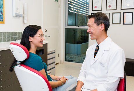Dr Edward Wong with patient