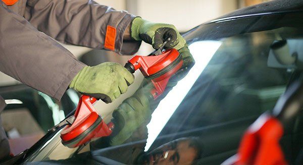 Car Wreck FAQ — Man Replacing Car Mirror in Littleton, CO