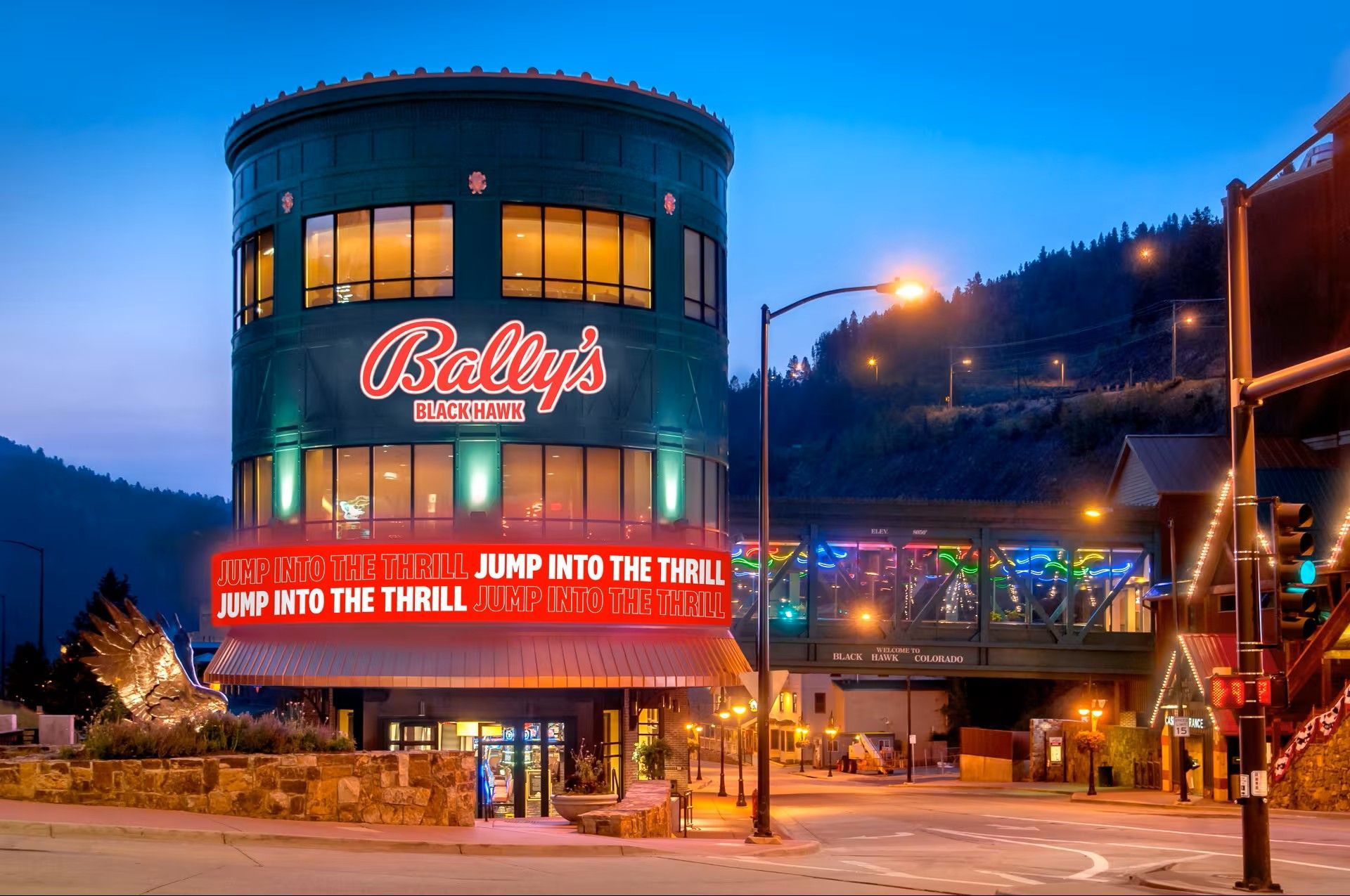 A large green building with the word bally 's on it