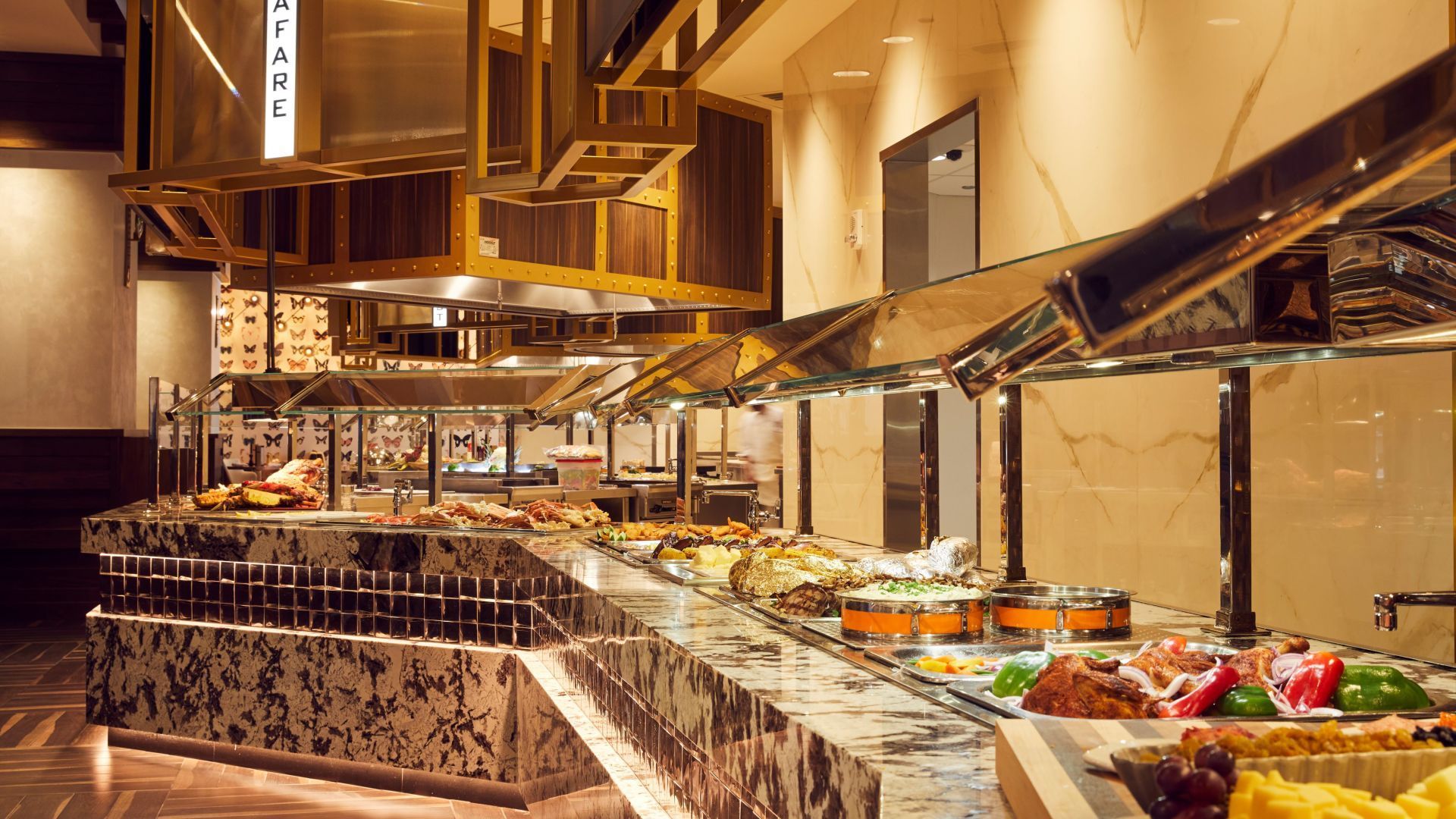 A buffet line with a sign that says ' buffet ' on it