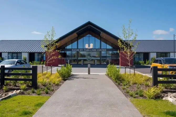 Residents at care centre entrance