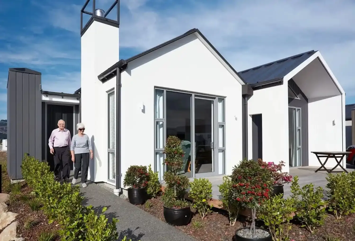 Residents outside village villa