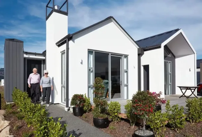 Residents outside village villa