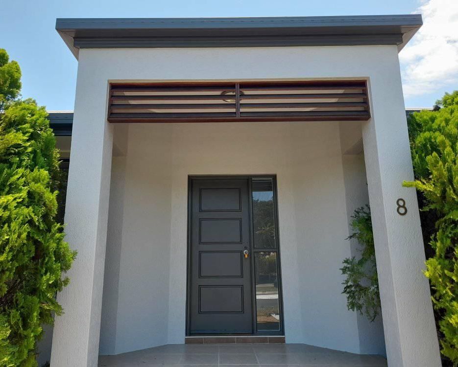 A Room With A Blue Wall And A Ceiling Fan — Kiwi Painter In Mooroobool, QLD