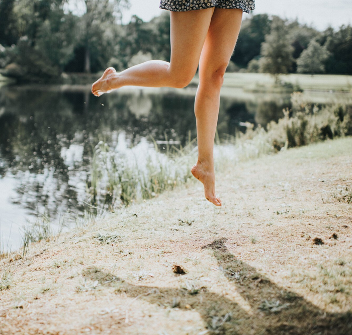 Woman Jumping — King County, WA — Ankle And Foot Specialists Of Puget Sound