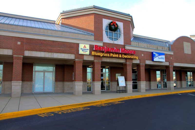 A brick building with a sign that says benjamin moore