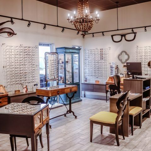 An optical shop with a chandelier hanging from the ceiling