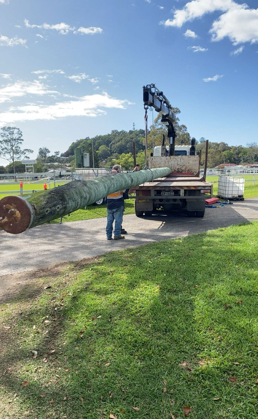 A Tree Trunk is Being Lifted on to a Truck — Brodees Crane Trucks in Murwillumbah, NSW