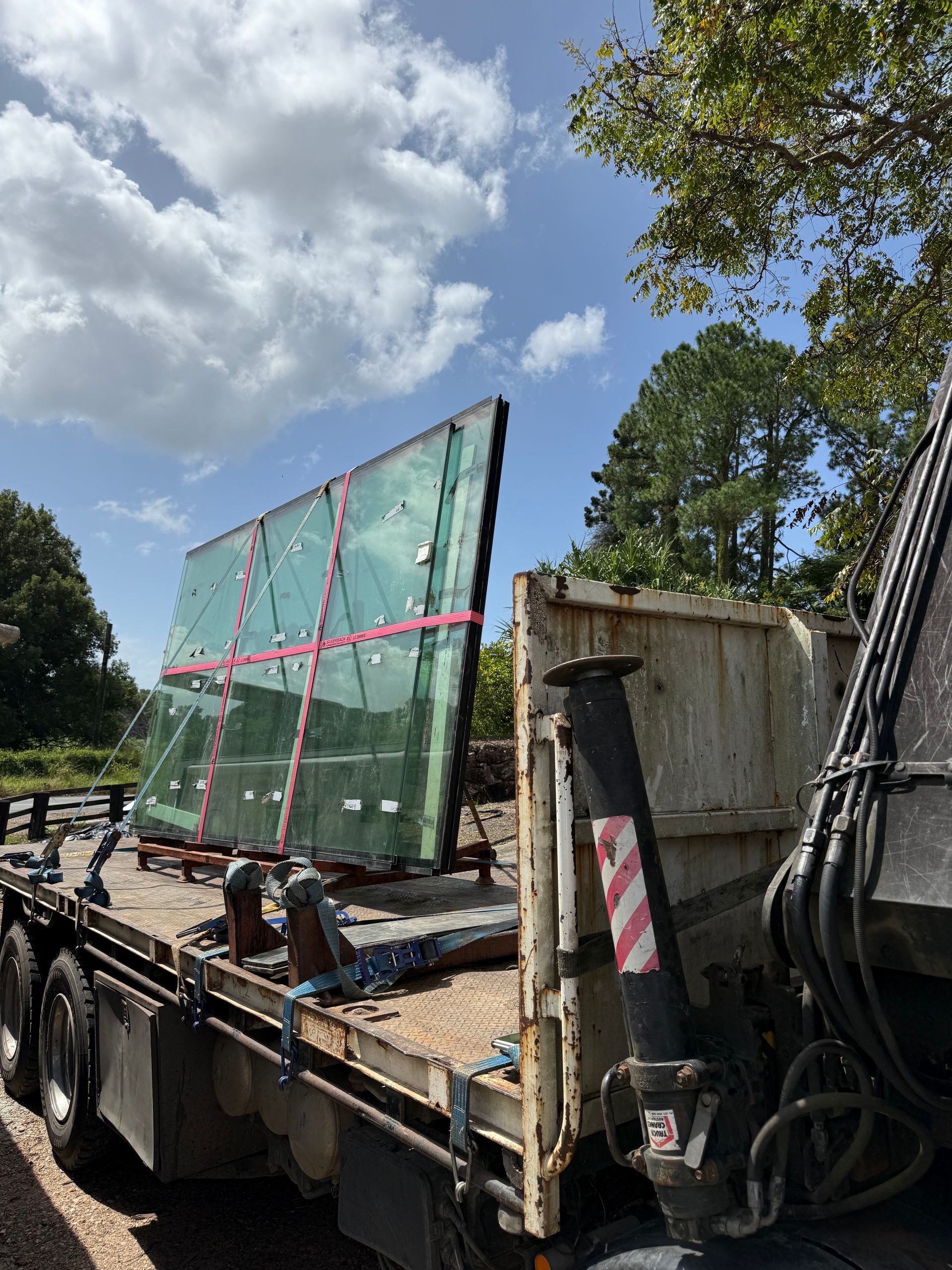 Glass is Being Transported on a Truck — Brodees Crane Trucks in Casino, NSW