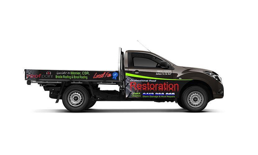 A Black Truck With a Coca Cola Logo on the Side of It — Roofpoint In Kawungan, QLD