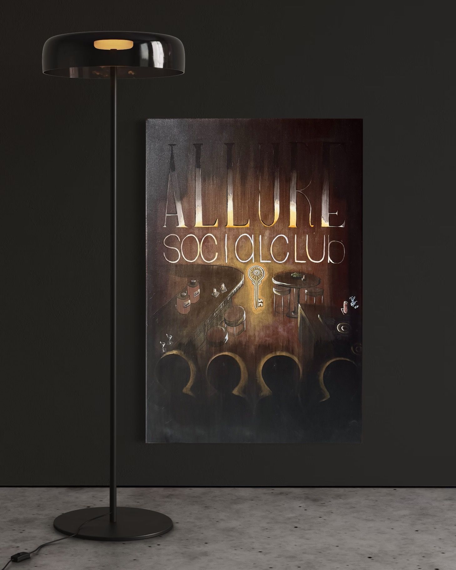 Floor lamp beside dark-toned art with the text 