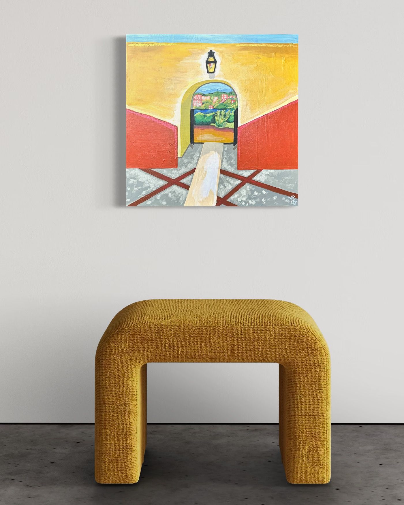 A painting of an arched doorway with an exterior view, above a yellow, rounded stool.