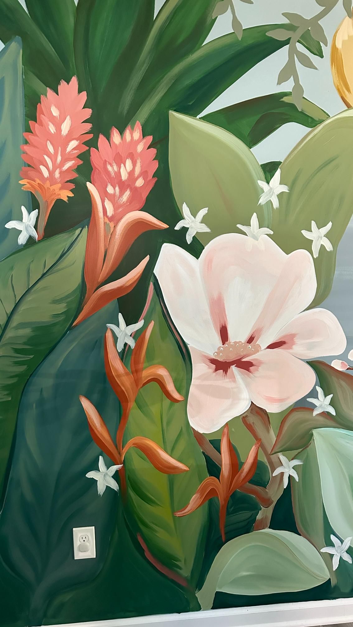 Mural of tropical flowers: peach and white blooms, green leaves, with white star-like flowers.