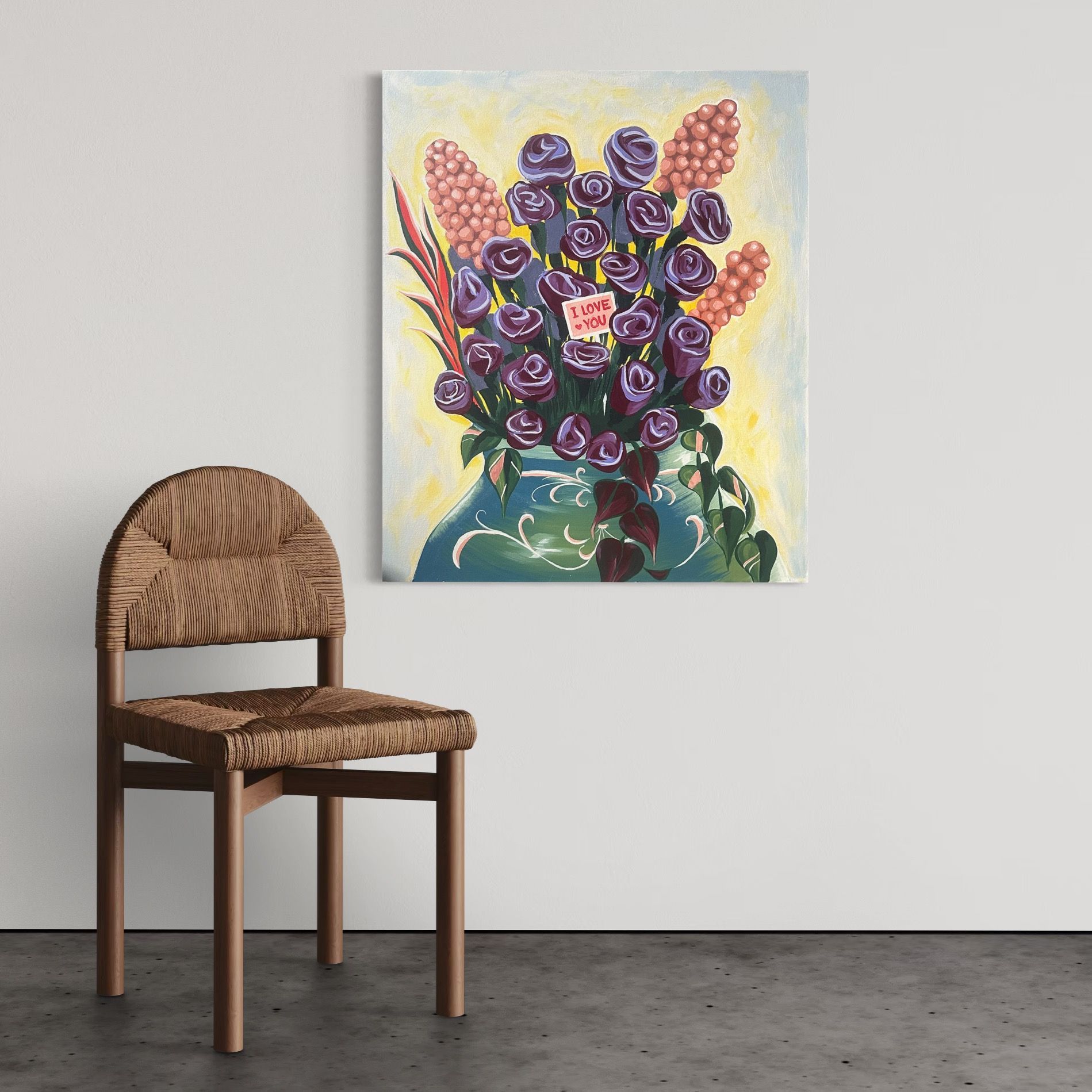 A painting of purple roses in a teal vase, with a wicker chair on a white wall.