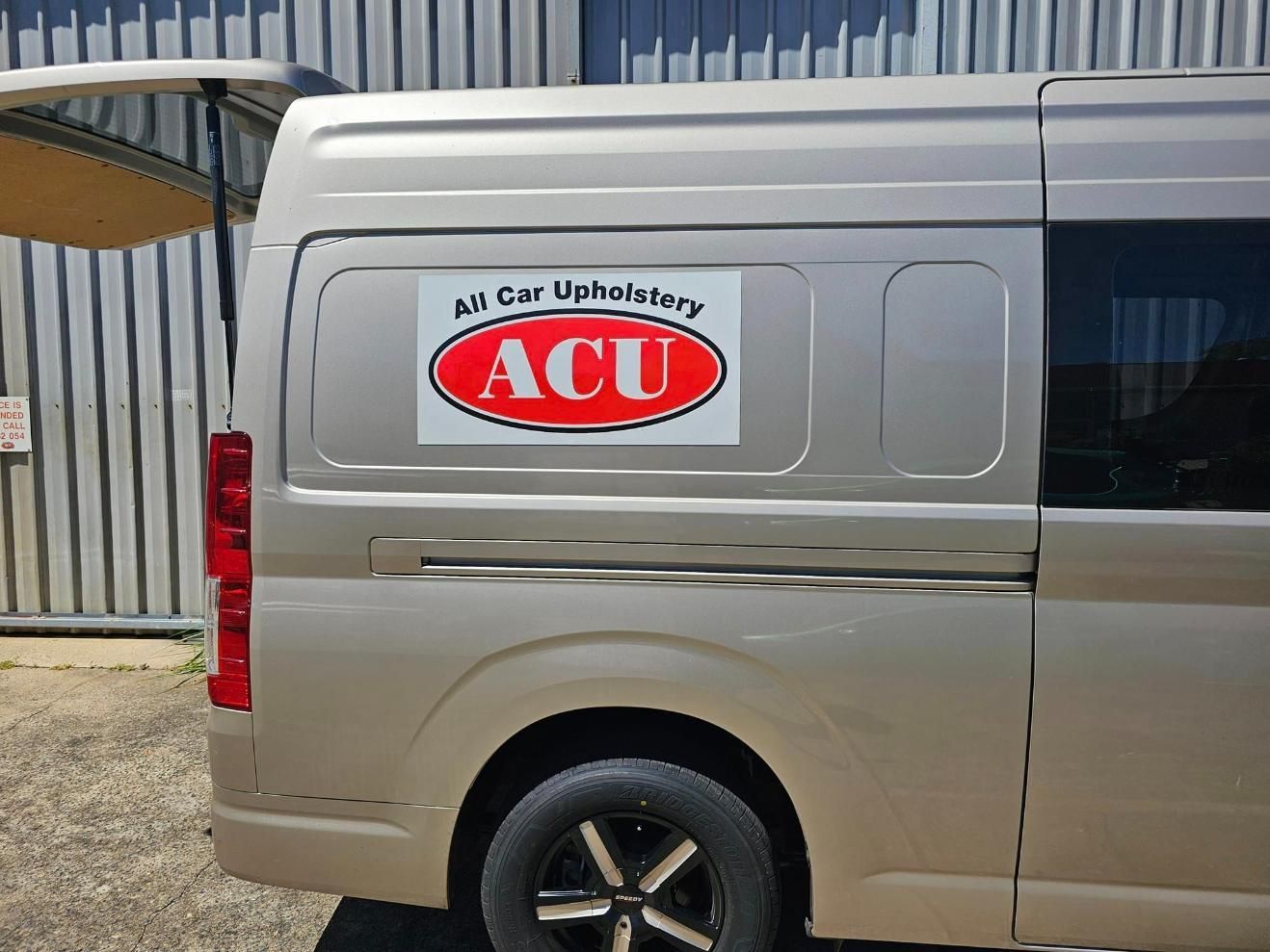 A Silver Van With The Word ACU On The Side — All Car Upholstery In Pinelands, NT