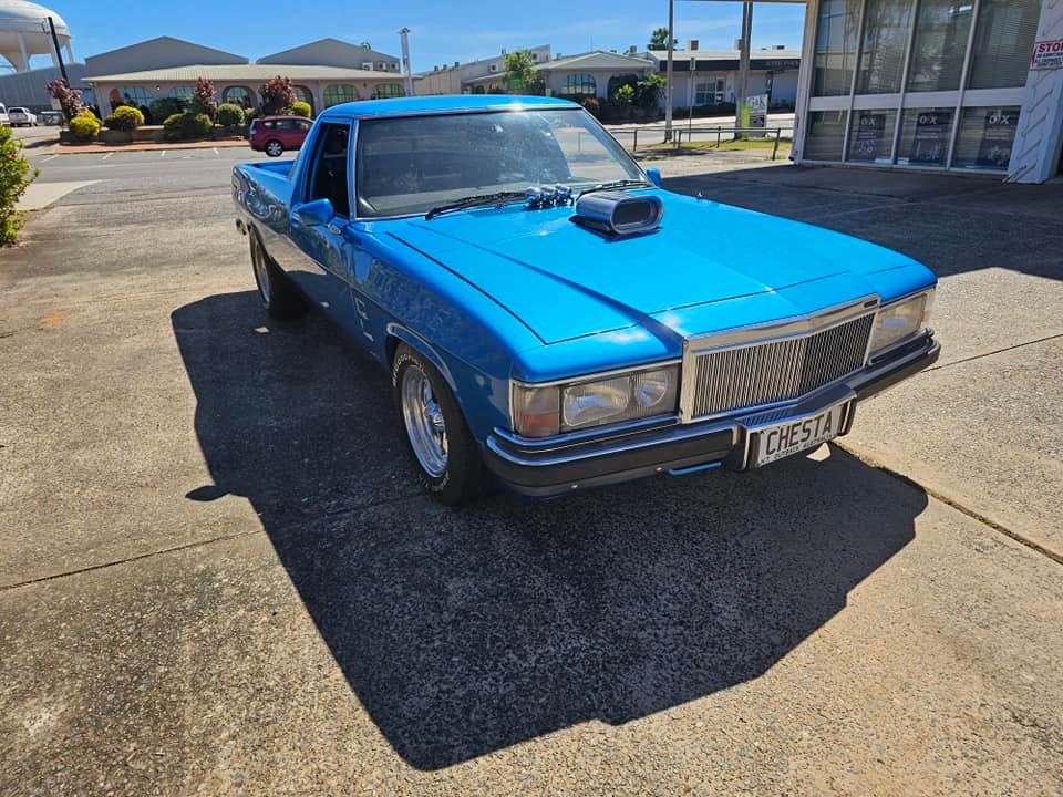 A Blue Pickup Truck Is Parked In A Parking Lot — All Car Upholstery In Pinelands, NT