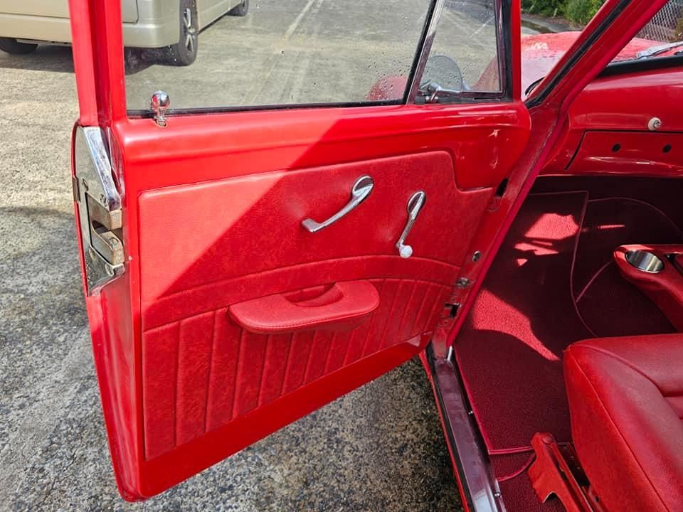 The Inside Of A Red Car With The Door Open — All Car Upholstery In Pinelands, NT