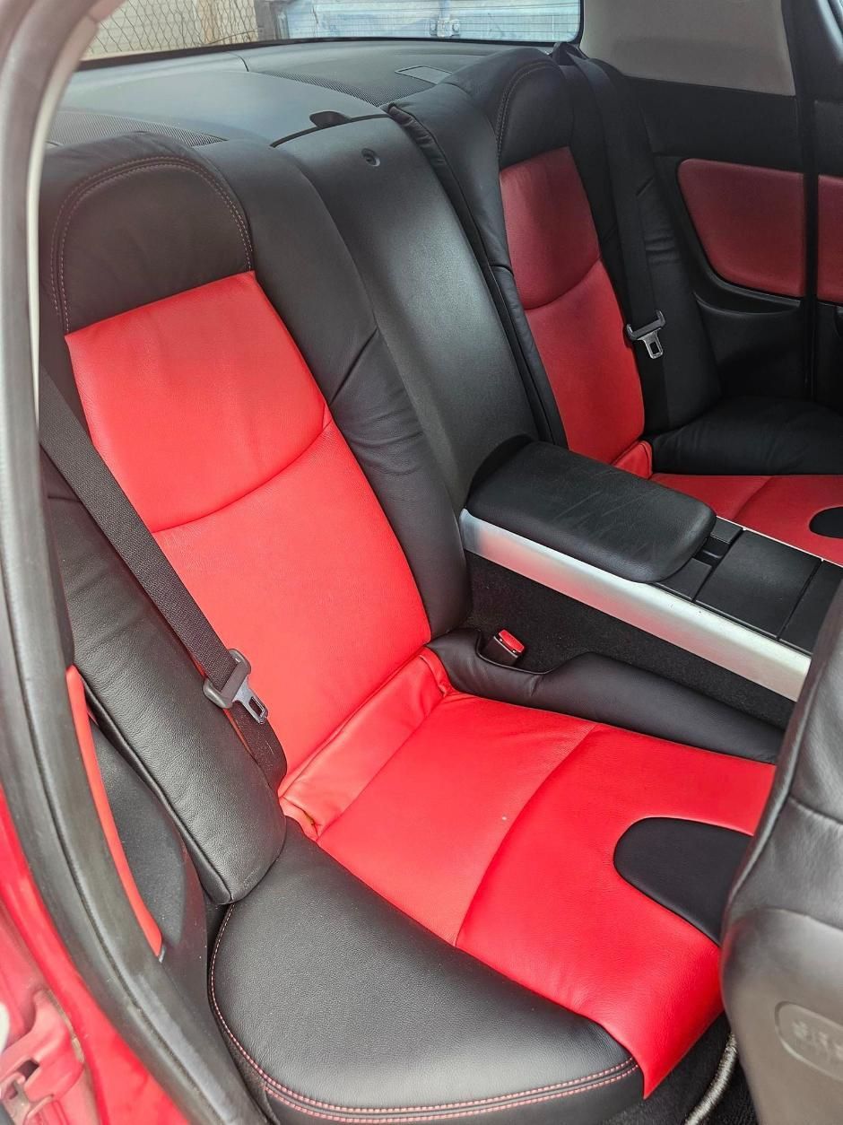 The Back Seat Of A Red Car With Black And Red Seats — All Car Upholstery In Pinelands, NT