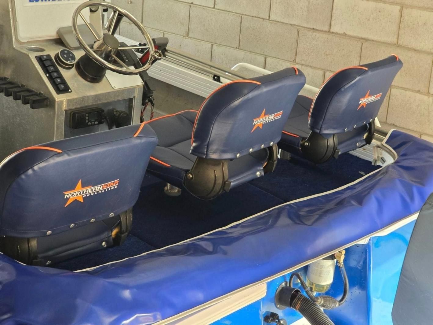 A Blue Boat With The Word Star Runner On The Seats — All Car Upholstery In Pinelands, NT