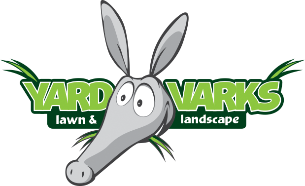 Cartoon aardvark peeking from Yard Varks Lawn & Landscape logo; green and gray.