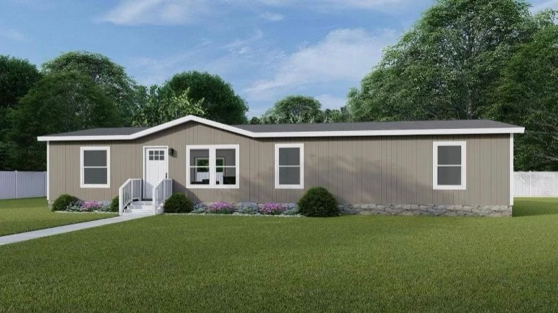 Two young boys are laying on the grass and talking to each other.